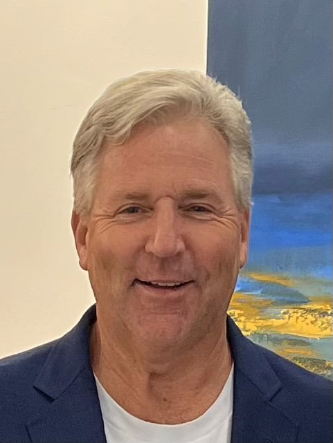 Joe Dooley, prostate cancer patient advocate, in a blue blazer