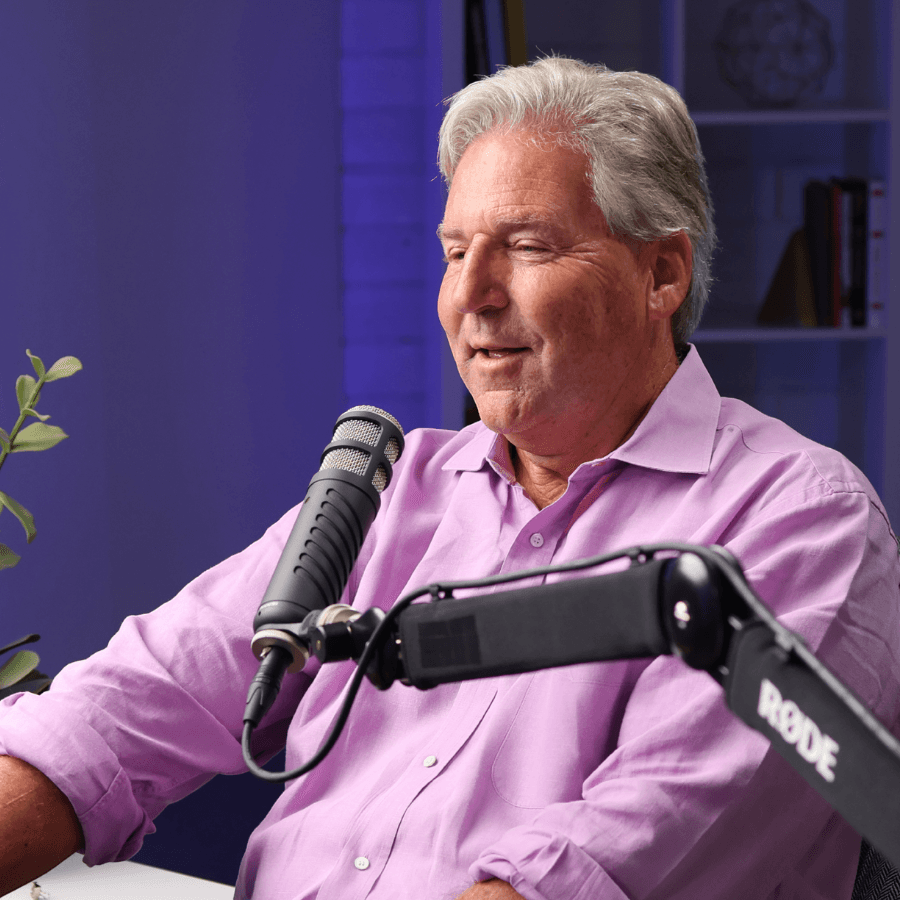 Joe Dooley recording at his podcast studio microphone